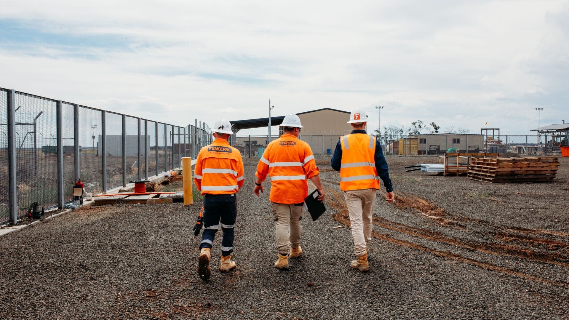 Fencepac crew walking alongside 358 mesh security fencing