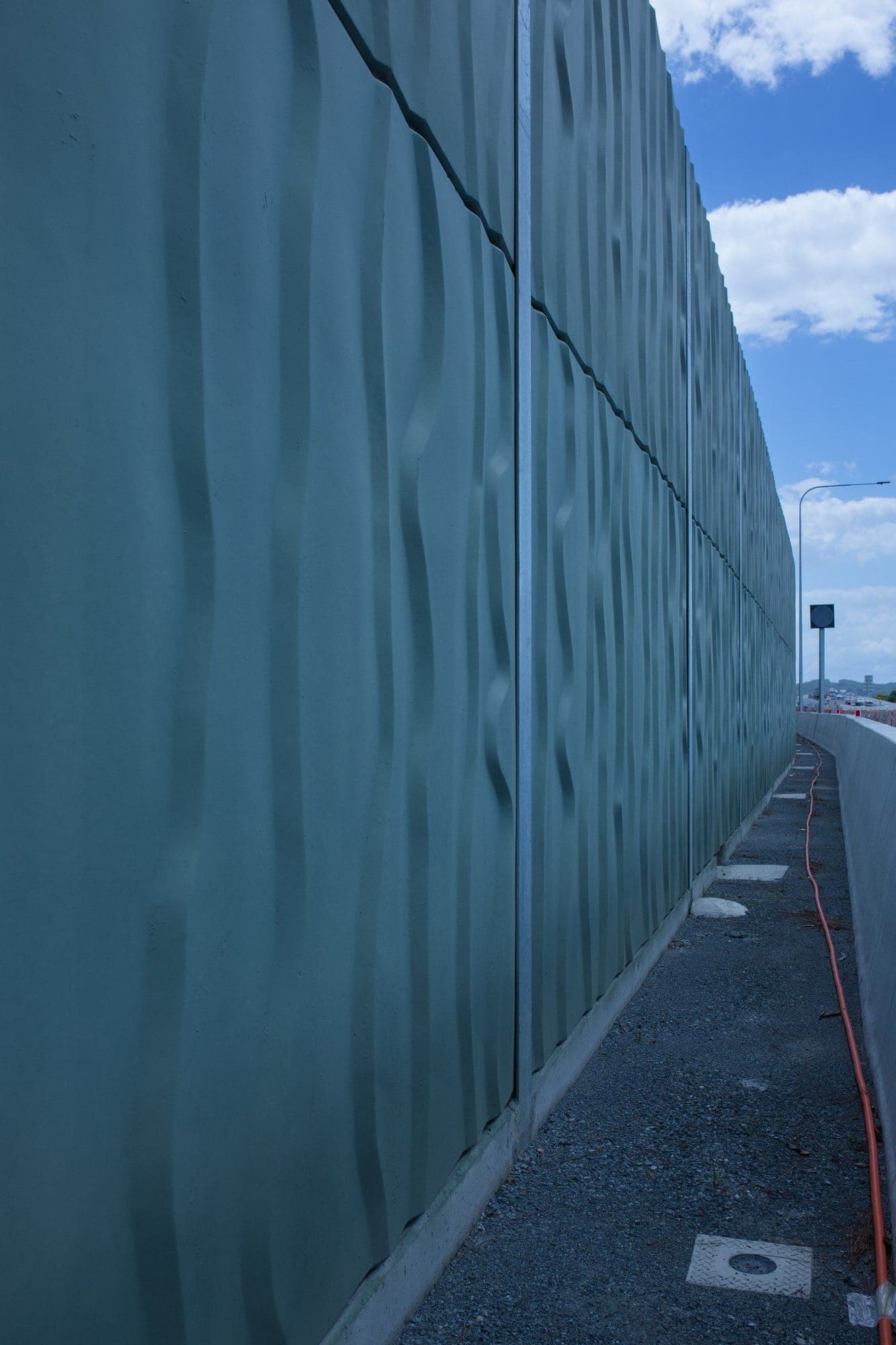 Teal textured noise panels close-up perspective