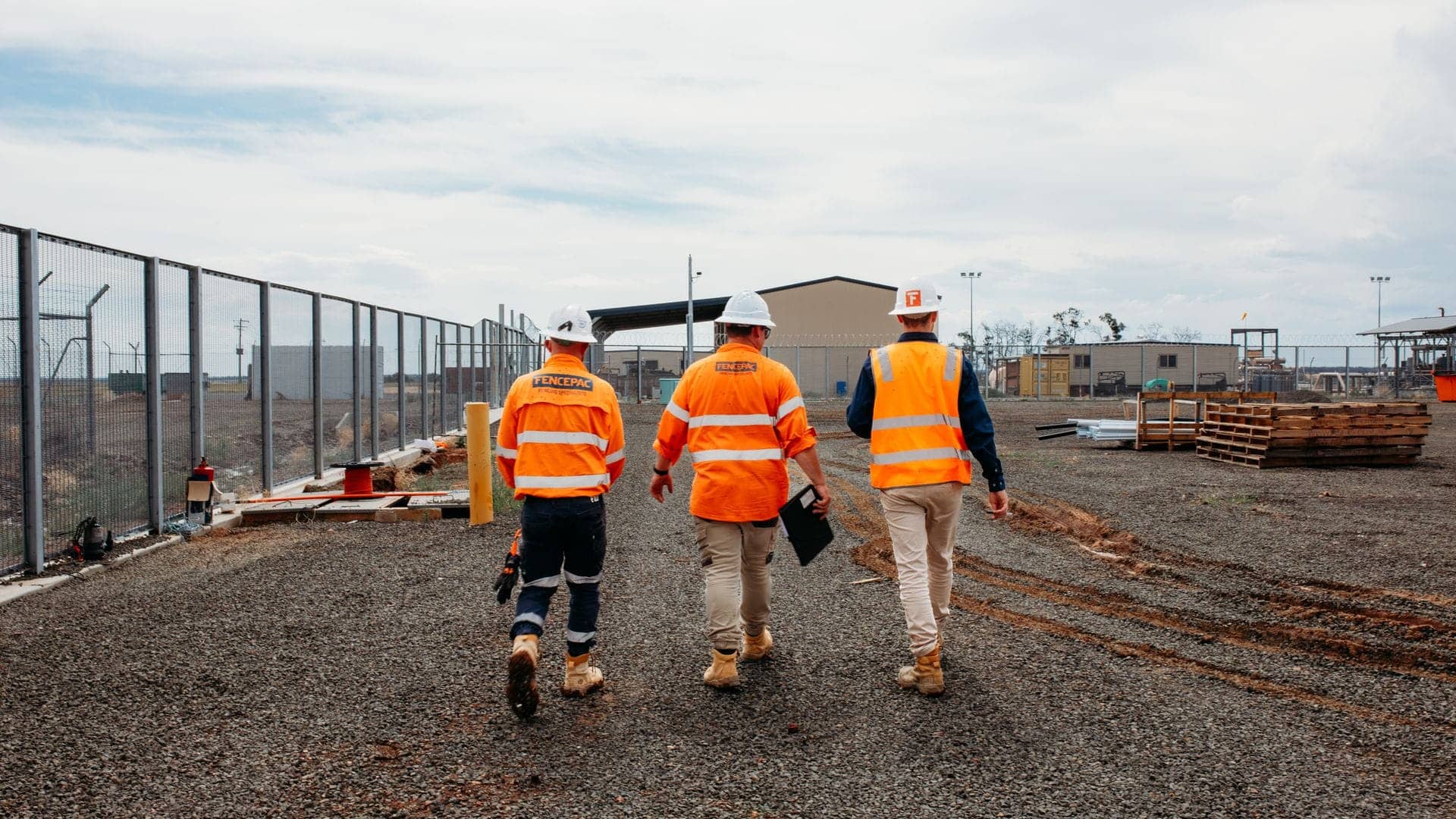 Fencepac crew walking alongside 358 mesh security fencing