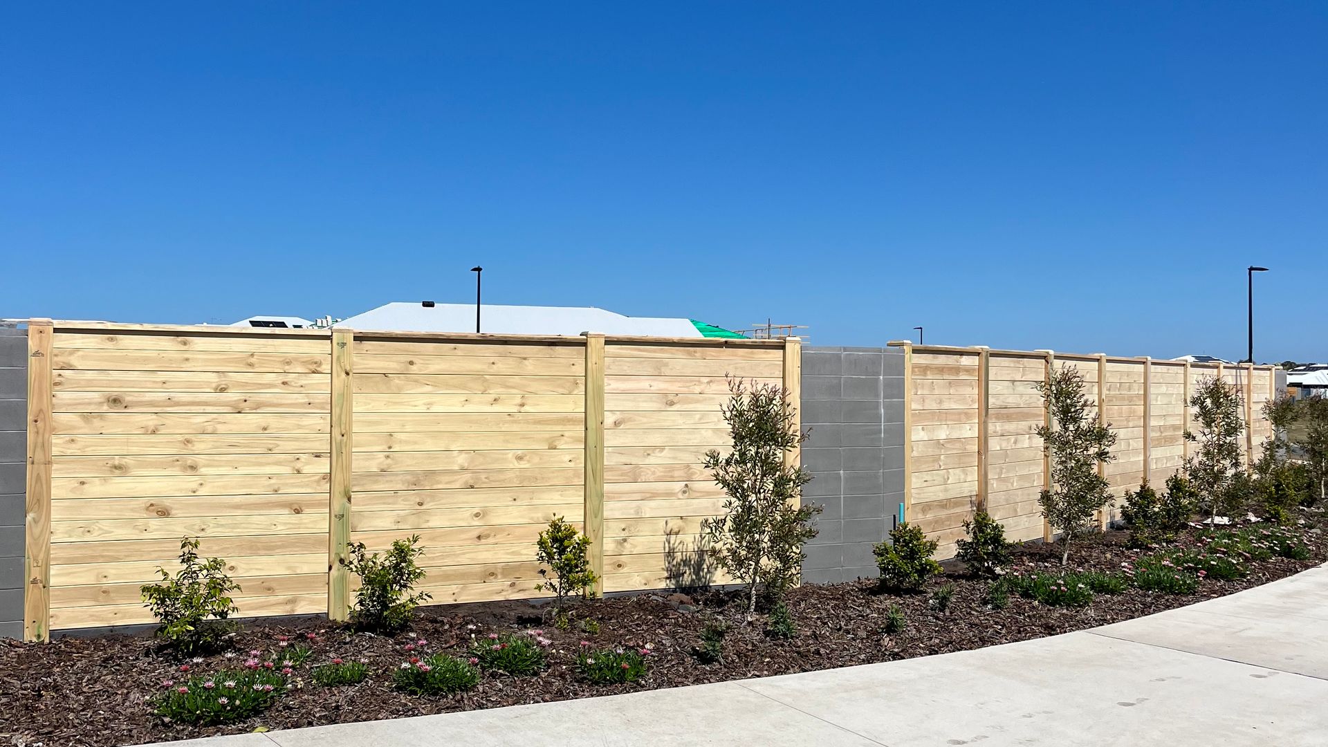Timber acoustic barrier panels with concrete base